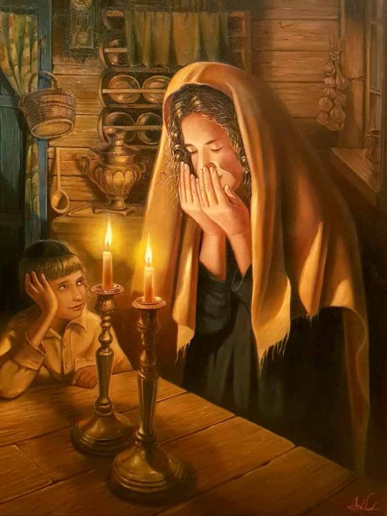 Women lighting Shabbat candles